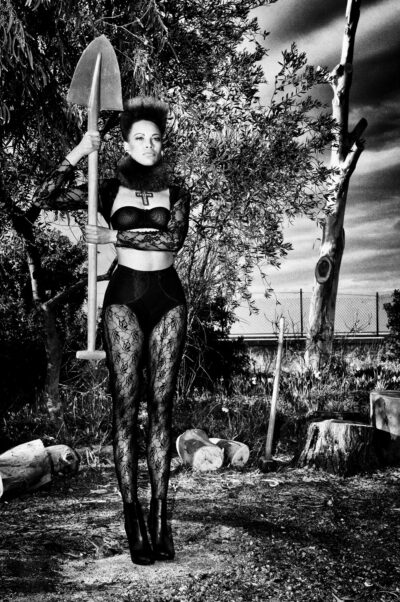 Woman with shovel, Orbetello, 2012